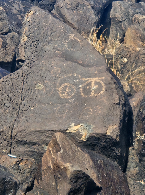 A rock with a drawing on it
AI-generated content may be incorrect.